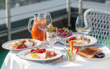 Breakfast, served table on the balcony