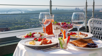 Breakfast, served table on the balcony