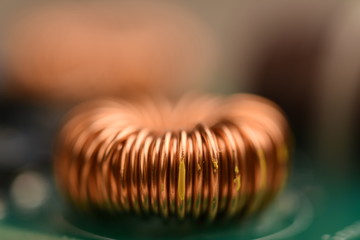 Macro of single copper coil  on motherboard