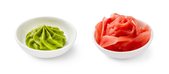 Wasabi and pickled ginger in bowls isolated on white background. - obrazy, fototapety, plakaty