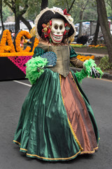 Seductive woman trying to attract humans to death. Disguised participant in the Day of the dead tradition in Mexico