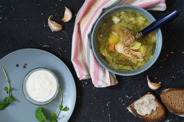 First course. Chicken soup and sour cream
