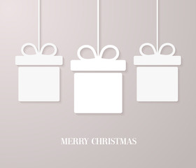 Christmas paper card with hanging gift boxes.