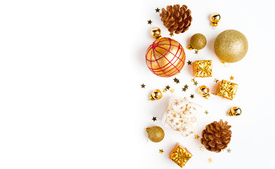 Christmas composition. Christmas golden decor, pine cone, star on white background. Flat lay, top view, copy space