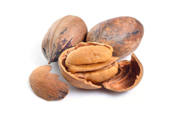 UnShelled pecan nuts isolated on white background.