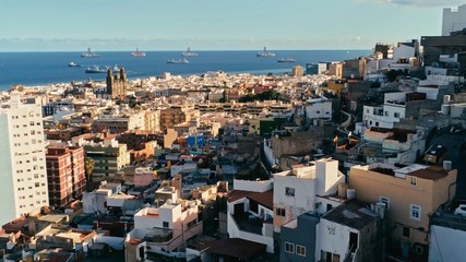 Fototapeta premium aerial drone footage of the city with beautiful seascape the old town at sunset