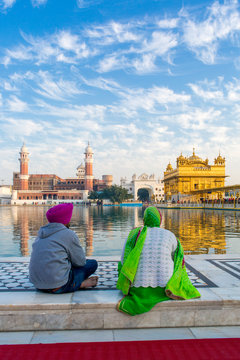 Sikhs at The Golden Temple (Harmandir Sahib) and Amrit Sarovar (Pool of Nectar) (Lake of Nectar), Amritsar, Punjab