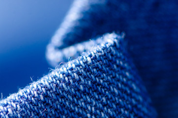 Blue jeans material fabric texture fashion seam fittings macro blur background