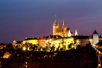 Fototapeta na wymiar Prague, Bohemia, Czech Republic. Historic center included in the UNESCO World Heritage. The Metropolitan Cathedral of Saints Vitus in to the largest ancient castle. Night scene.
