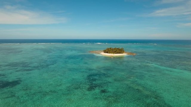 Aerial footage sand beach and palm trees on tropical island with turquoise sea. tropical seascape Siargao, Philippines Tropical landscape ocean, sky, sea