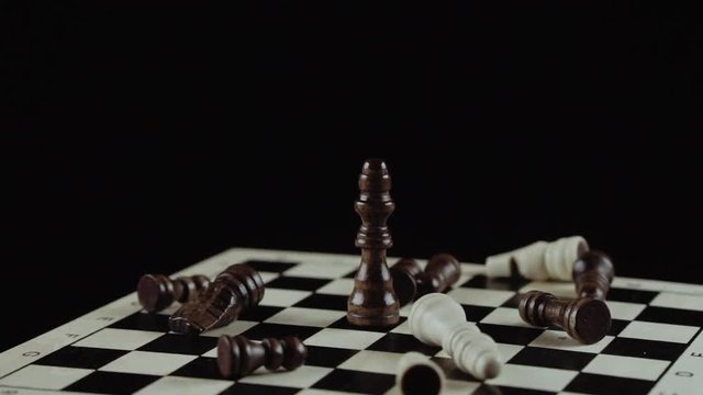 chess game on black background close up