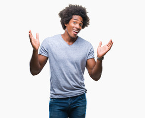 Afro american man over isolated background clueless and confused expression with arms and hands raised. Doubt concept.