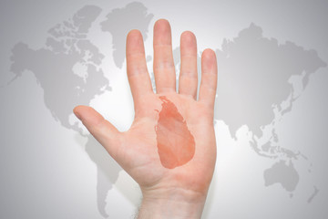 hand with map of sri lanka on the gray world map background.