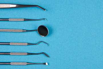 Professional Dentist tools in dental office close-up, top view