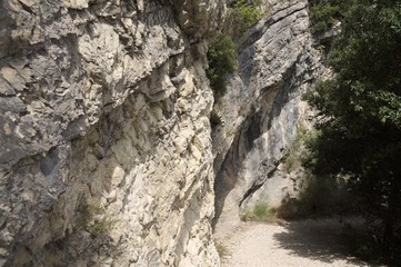 Pathway in the rocky side of a mountain (Marche, Italy, Europe)