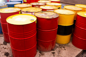 colored metal barrels. Blue oil drums containing fuel for transportation