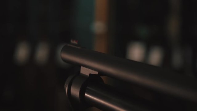 Muzzle of double barreled shotguns pointed - macro shooting. Hunting rifle takes aim at the victim. Eyes on the target.