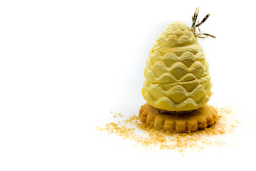 Fir-cone form сake, with vanilla sugar, isolated on a light background