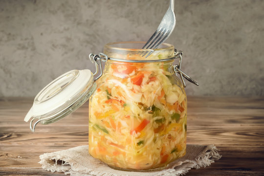 Salad appetizer of fermented vegetables sauerkraut carrots and peppers