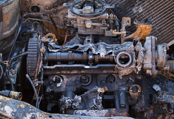 Closeup photo of a burn out car engine