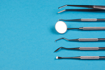 Professional Dentist tools in dental office close-up, top view