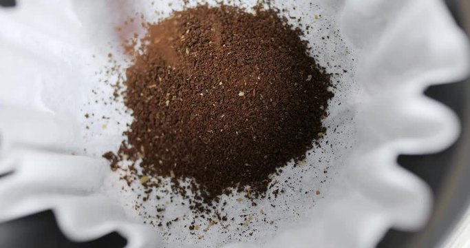 Medium fine grind coffee add into bowl