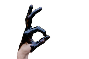 Caucasian hands cupped with black petrol isolated on white background. oil leaking. Very dirty hand.