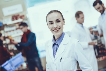 Young Female Pharmacist Smiling