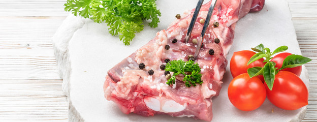 Fork in piece of meat pork brisket ribs spatula