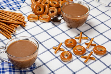 Noughts and crosses using biscuits. Selective focus.