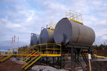 Fototapeta premium Oil industry. Oil Storage Tanks for petroleum products at the refinery. Septic tanks will bring down the use of underground water treatment plant.