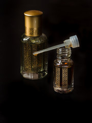 Arabian oud attar perfume or agarwood oil fragrances in mini bottle
