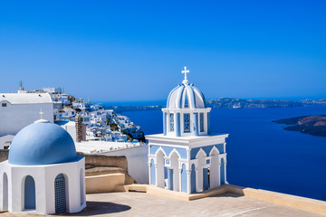 Church in Firostefani, Santorini Island, Greece, with view over volcanic caldera