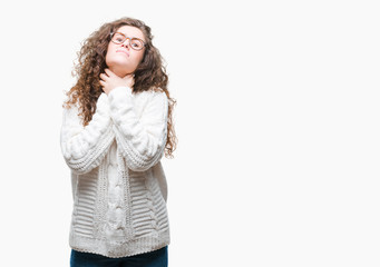 Beautiful brunette curly hair young girl wearing winter sweater over isolated background shouting and suffocate because painful strangle. Health problem. Asphyxiate and suicide concept.