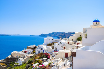 Traditional white architecture and volcanic caldera at Oia, Santorini Island, Greece