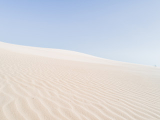 Amazing white dune, sand texture , blue sky pastel color, Brazil, Parnaíba.  