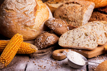 fresh bread and wheat on the wooden