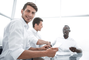 Obraz premium close up.businessman using digital tablet in office