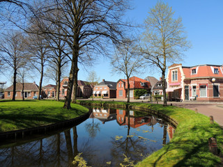 Central street in town Spijk, Dutch province Groningen, Netherlands