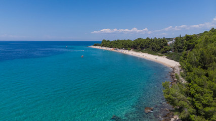 Fototapeta na wymiar Drone aerial view of sea shore, sandy beach and blue water
