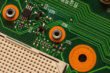 Glowing modern processor. Big illuminated graphic processor surrounding by other electrical...