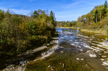 Fototapeta na wymiar Stuposiany, Bieszczady Mountains, Poland. Wolosatka stream approaching to San river. Sunny day with natural environement. 