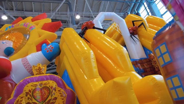 Beautiful, colorful, cute, safe, fun inflatable children's attraction. Shot in motion