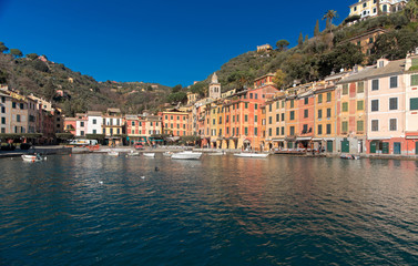 Fototapeta na wymiar A clear blue day in the port of Portofino, Italy