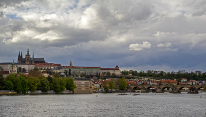 view of castle and charles bridge in prague