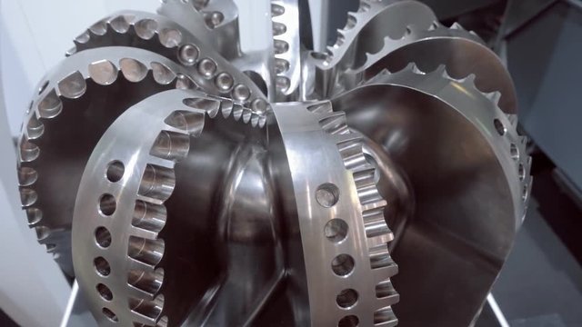 The milled billet drilling head for wells for petro and gas production. Shot in motion
