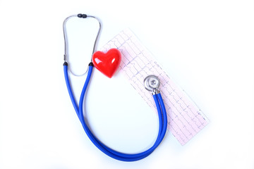 Heart with a medical stethoscope, isolated on wooden background
