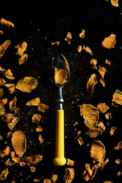Tumeric Chips from Sri Lanka in a spoon