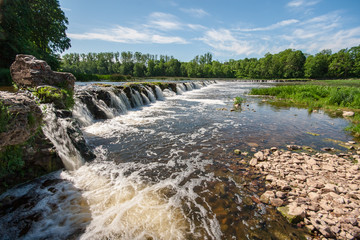 fresh clean waterfall in summer