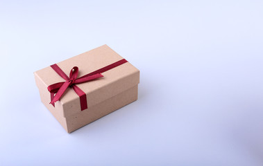 Gift boxes with bow on wood background. Christmas Decoration